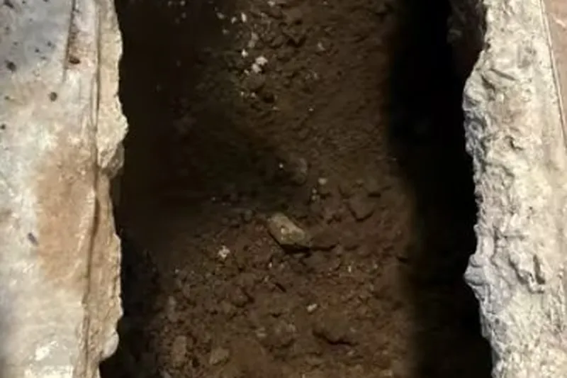 Opened concrete floor area for slab leak detection and repair for Acoustic leak detection